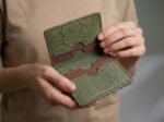 green and brown cork cardholder with model